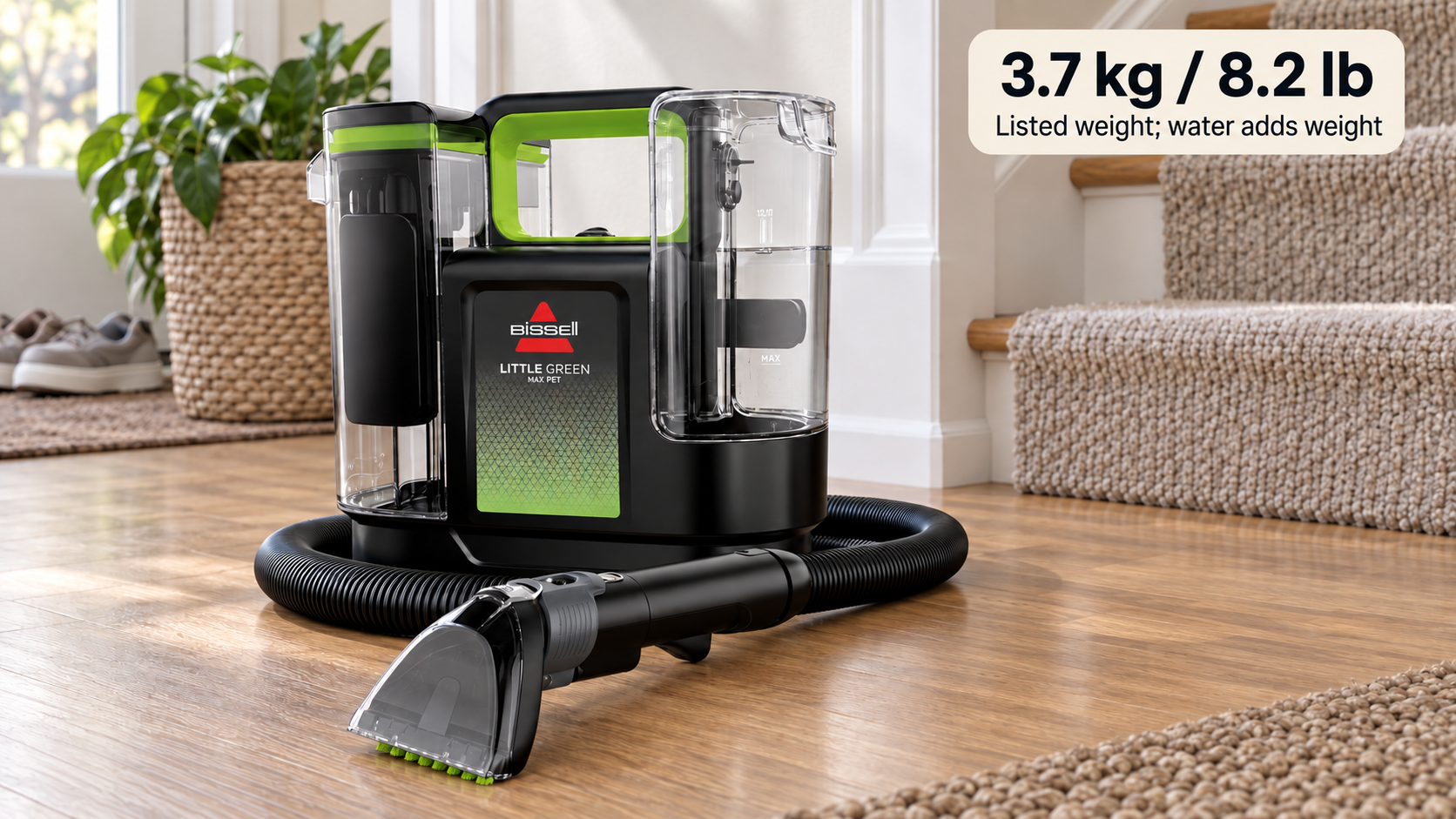 BISSELL 3860B on a level floor beside stairs, labelled 3.7 kg or 8.2 lb before added water